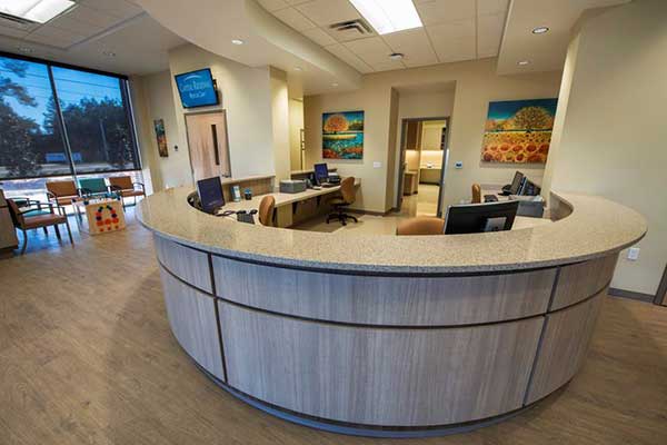 the front desk reception area with a round desk